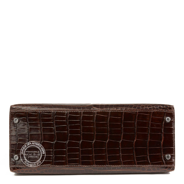 Hermès Kelly 28cm Chocolate Shiny Croc PHW - Preloved