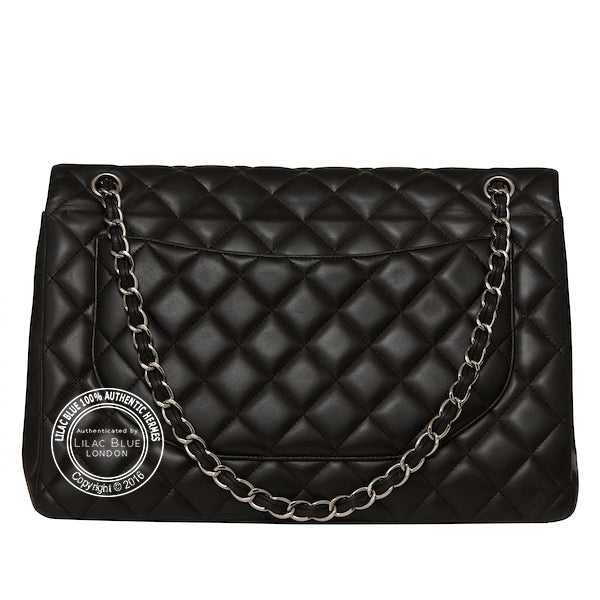Chanel Classic Maxi Flap Bag in Black. Silver - Preloved