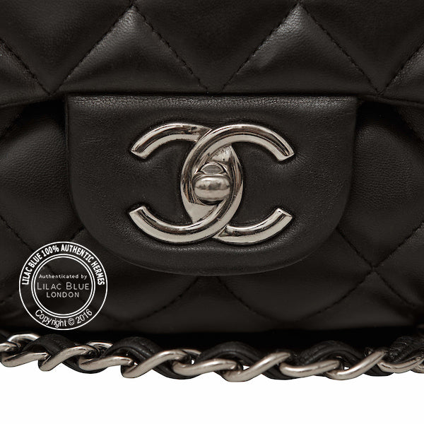 Chanel Classic Maxi Flap Bag in Black. Silver - Preloved