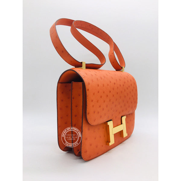 Hermès Constance 24cm Tangerine Ostrich GHW