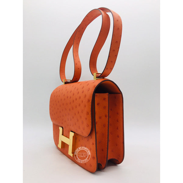 Hermès Constance 24cm Tangerine Ostrich GHW