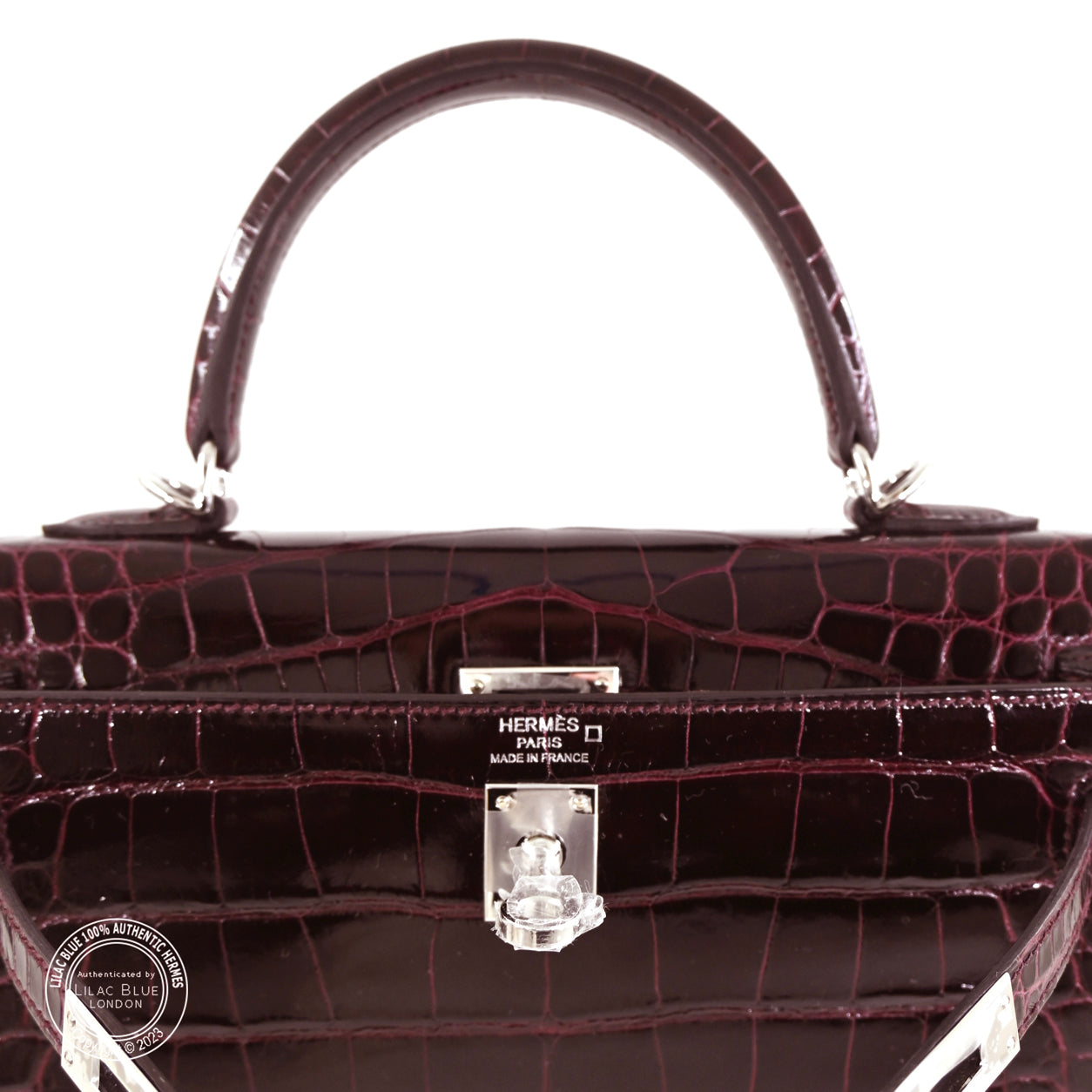 Hermès Kelly 25cm Bordeaux Shiny Porosus PHW