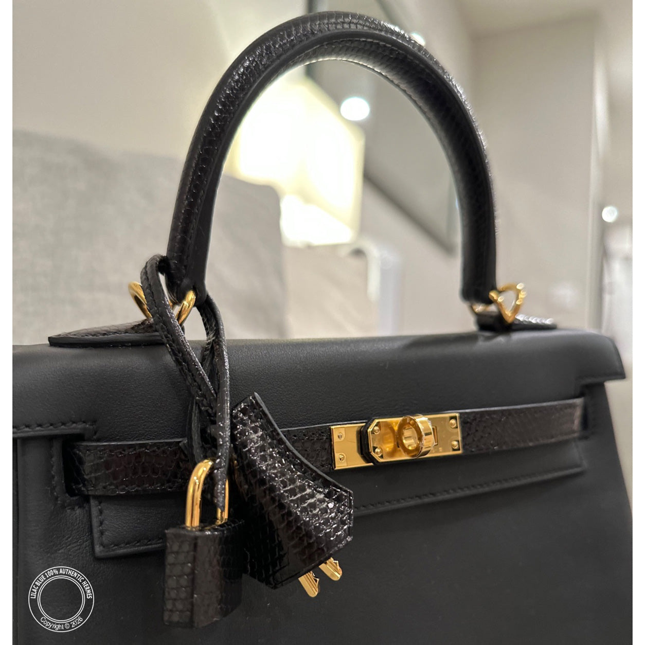 Hermès Kelly 25cm Black Touch Swift/Lizard GHW