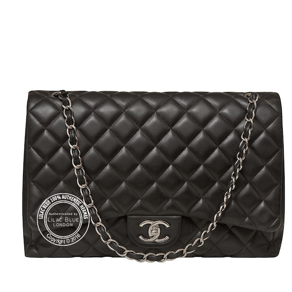 Chanel Classic Maxi Flap Bag in Black. Silver - Preloved